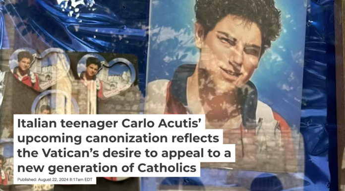 Carlo Acutis souvenirs displayed in a shop window in Assisi in June 2024. Michael Di Giovine, CC BY